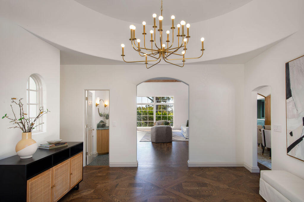 1839 East Mountain Drive Montecito, CA 93108 - Photo 5 of 24 a view of a room with chandelier and wooden floor