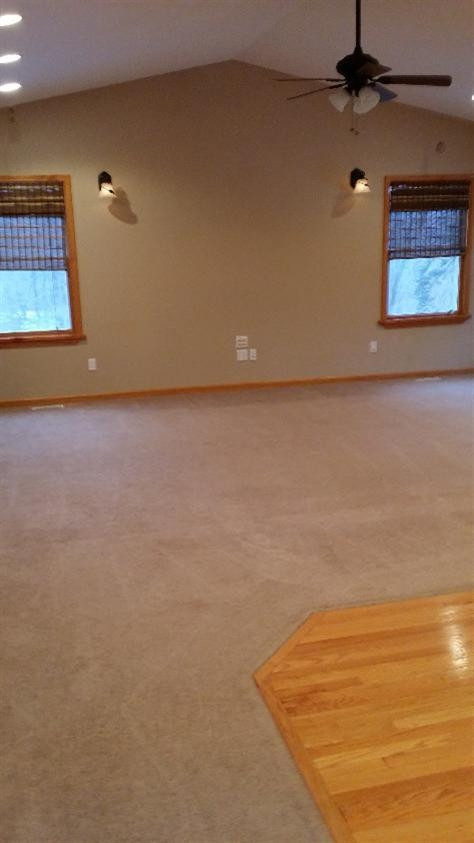 75 South Smoke Road Kouts, IN 46347 - Photo 9 of 10 a view of a room with an empty space and a ceiling fan