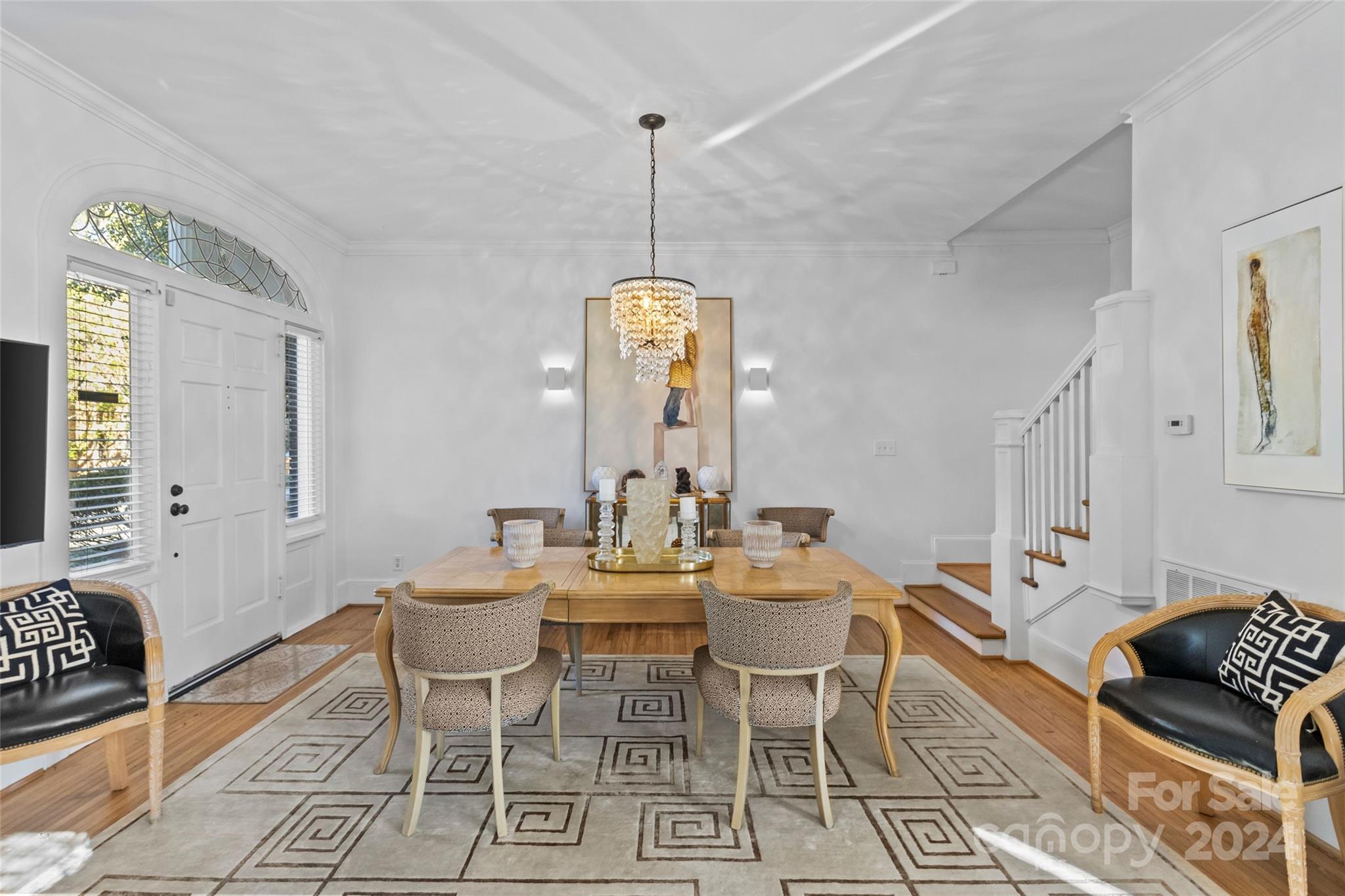 609 Queens Road, Unit A Charlotte, NC 28207 - Photo 7 of 33 a view of a dining room with furniture