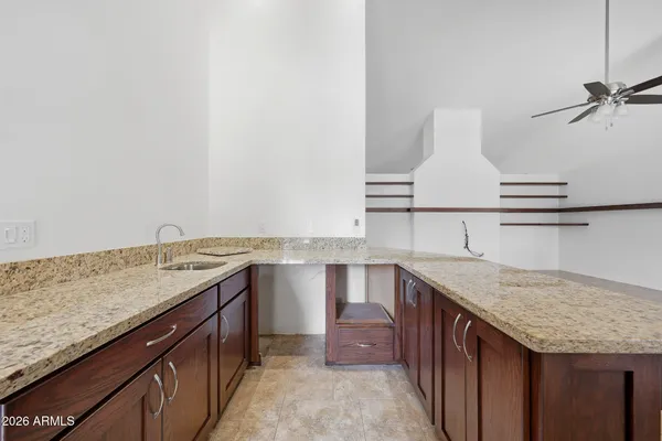 a view of a livingroom with a staircase