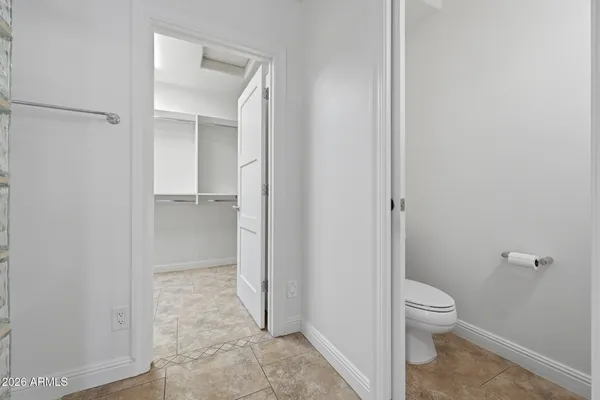 a view of an empty walk in closet