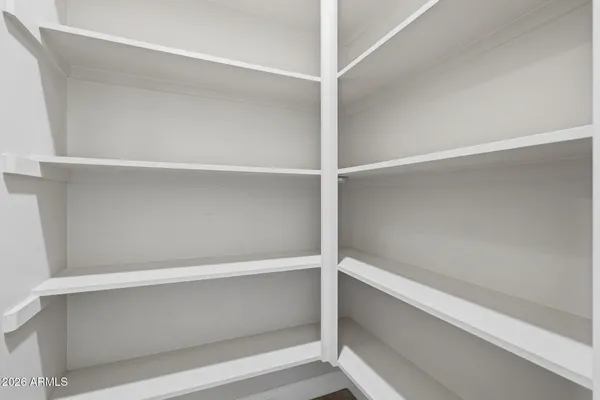 a bathroom with a sink vanity and a mirror