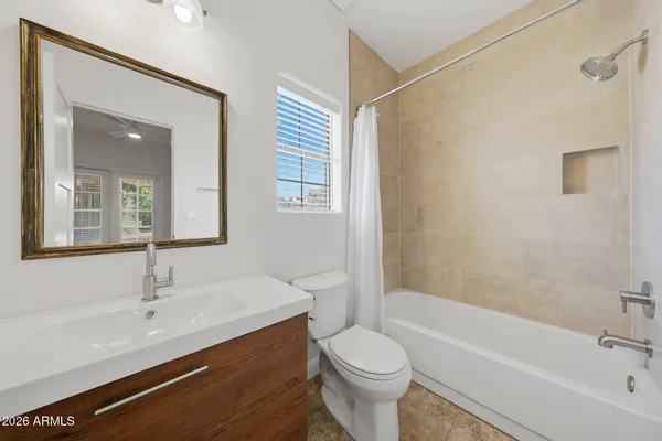 a front view of a house with yard