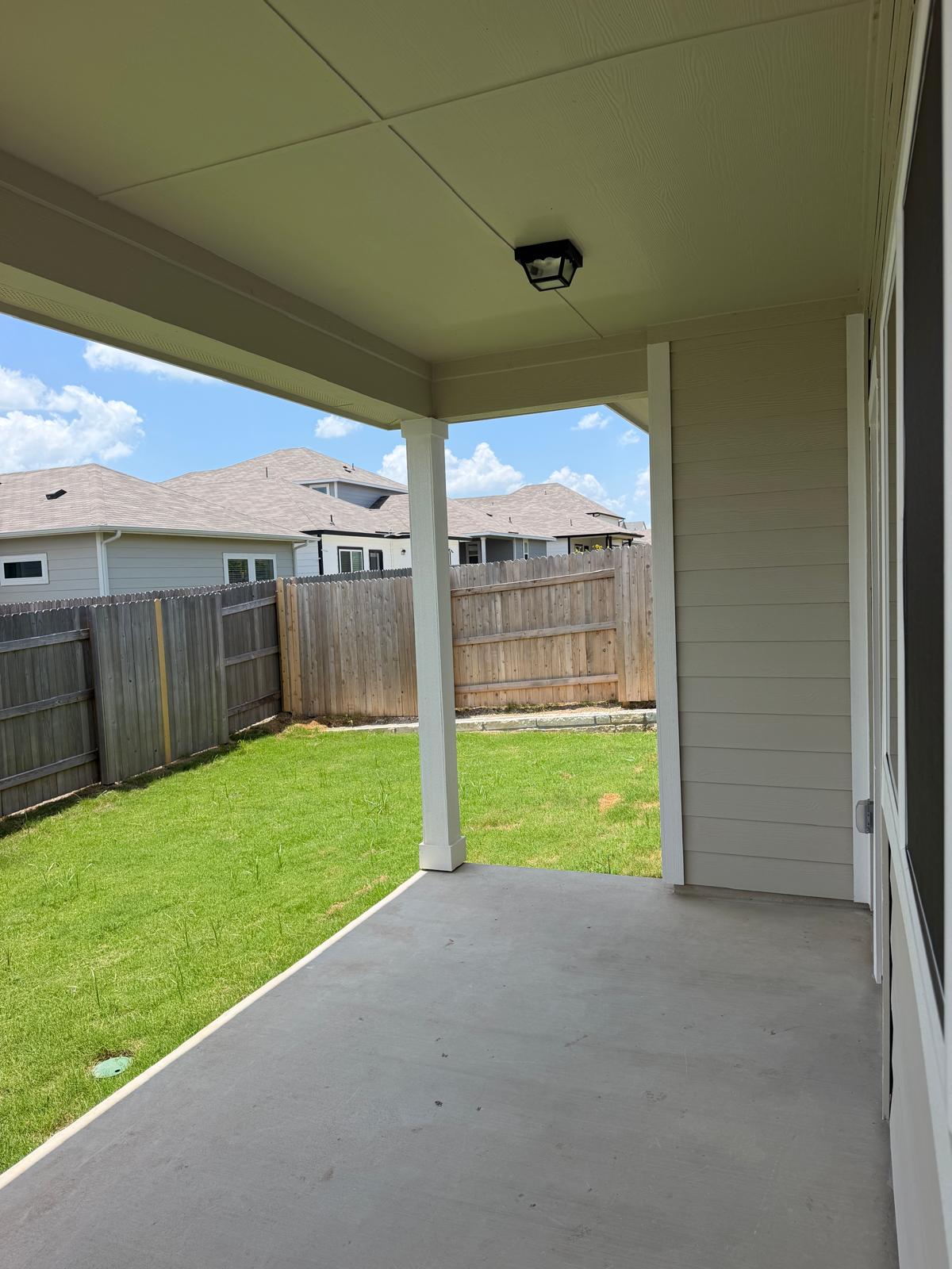 2701 Towy Road Manor, TX 78653 - Photo 32 of 35 A private backyard oasis awaits, perfect for entertaining or quiet enjoyment.