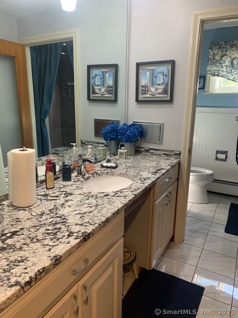 62 Cedarwood Road Berlin, CT 06037 - Photo 13 of 37 a kitchen with sink and a refrigerator