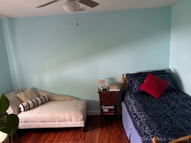 62 Cedarwood Road Berlin, CT 06037 - Photo 20 of 37 a bedroom with a bed and a chair