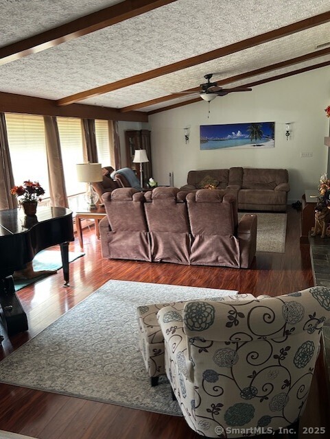 62 Cedarwood Road Berlin, CT 06037 - Photo 21 of 37 a living room with furniture and a wooden floor