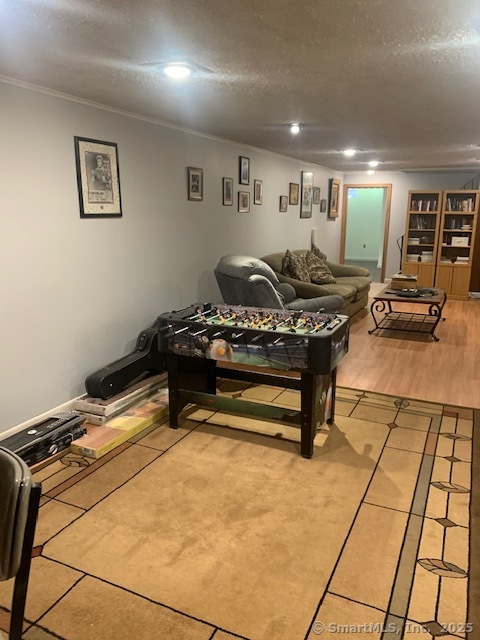 62 Cedarwood Road Berlin, CT 06037 - Photo 29 of 37 a livingroom with furniture and a table