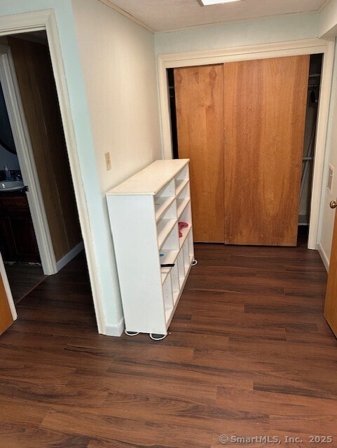 62 Cedarwood Road Berlin, CT 06037 - Photo 34 of 37 a view of an empty room with wooden floor and a window