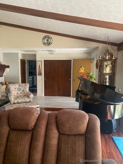 62 Cedarwood Road Berlin, CT 06037 - Photo 7 of 37 a living room with furniture and a wooden floor