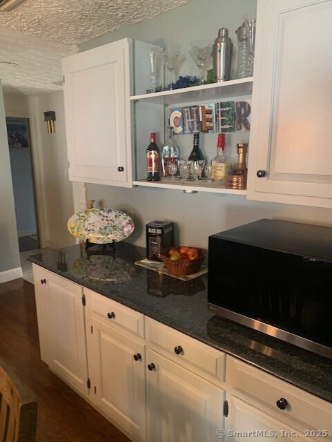 62 Cedarwood Road Berlin, CT 06037 - Photo 10 of 37 a kitchen with a sink and cabinets