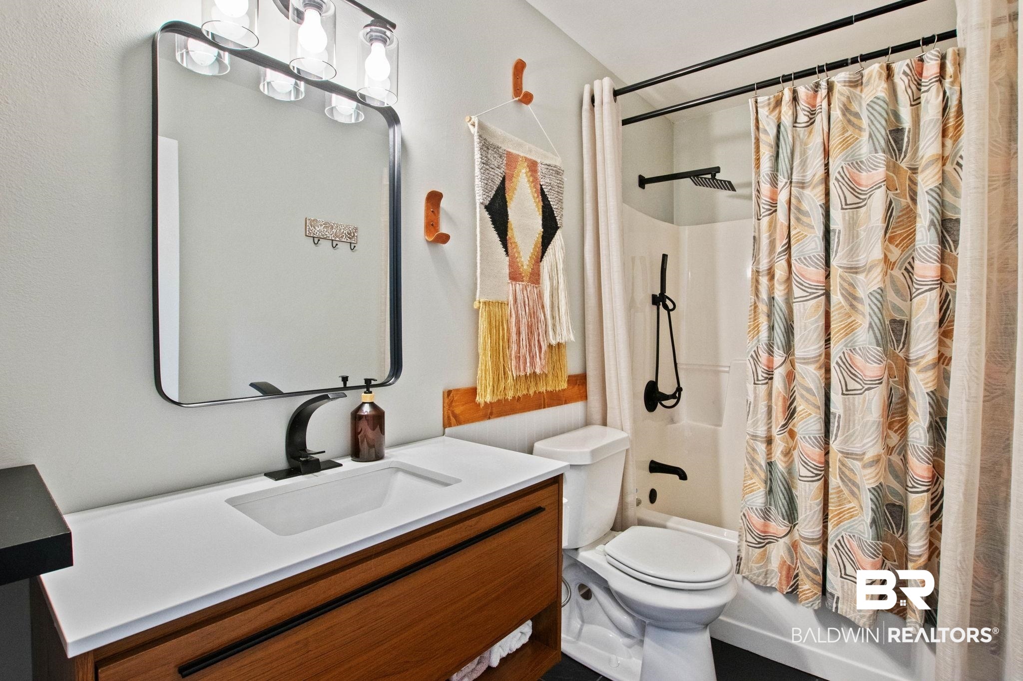 524 Ariel Avenue Foley, AL 36535 - Photo 22 of 37 Bathroom featuring a wood-finish vanity with an integrated sink and white countertop