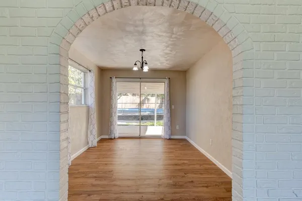 a view of an empty room and window