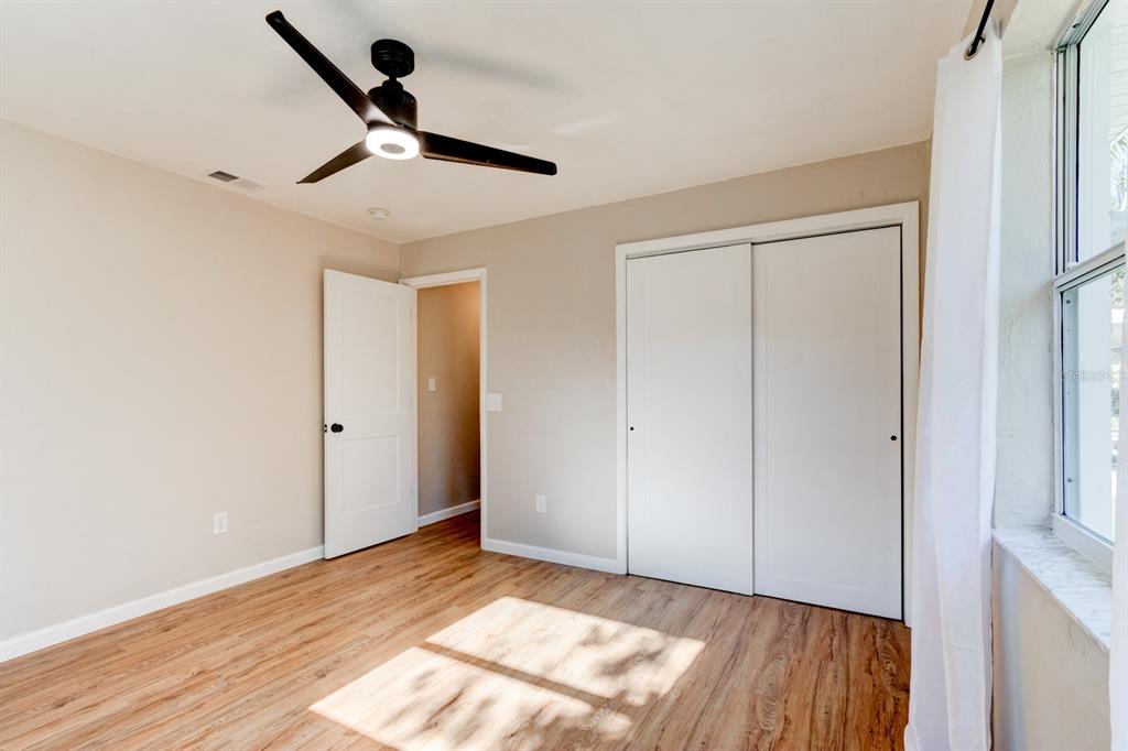 13 Highridge Road Daytona Beach, FL 32117 - Photo 23 of 27 a view of an empty room and wooden floor