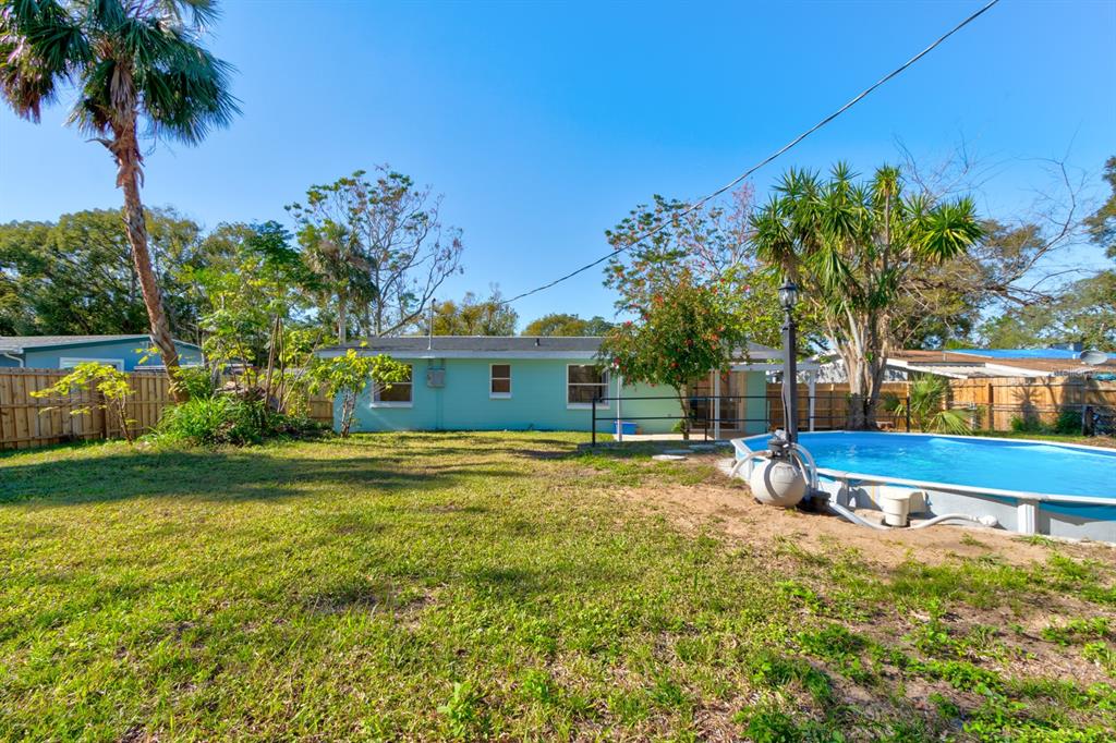 13 Highridge Road Daytona Beach, FL 32117 - Photo 27 of 27 a front view of a house with garden