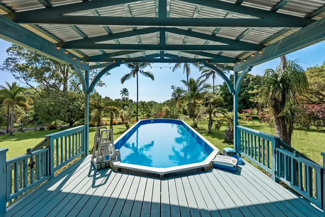a view of balcony with wooden floor