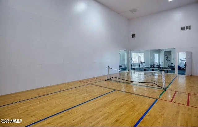 a view of a kitchen with kitchen island a sink and dishwasher