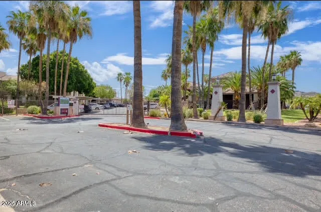 a view of road with a building in the background