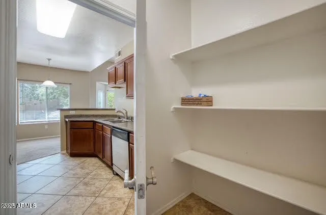 a kitchen with stainless steel appliances a stove and a refrigerator