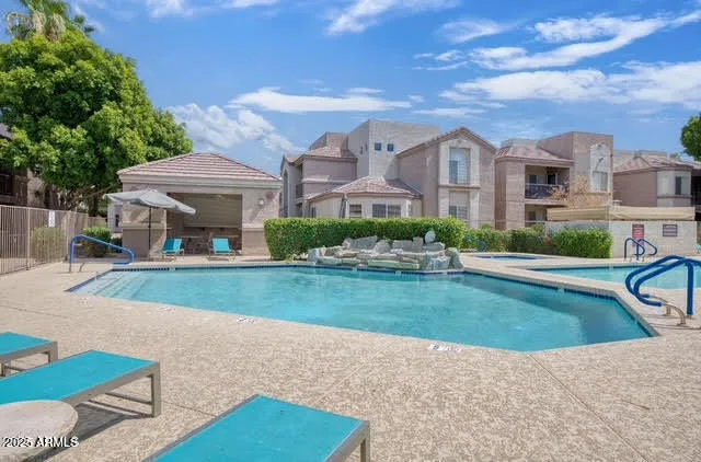 a view of a house with a swimming pool