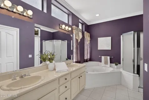 a bathroom with a sink a vanity and a mirror