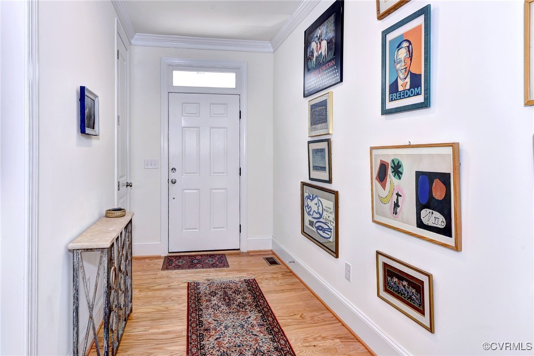 112 Nottinghamshire Williamsburg, VA 23188 - Photo 7 of 50 a view of an entryway with wooden floor