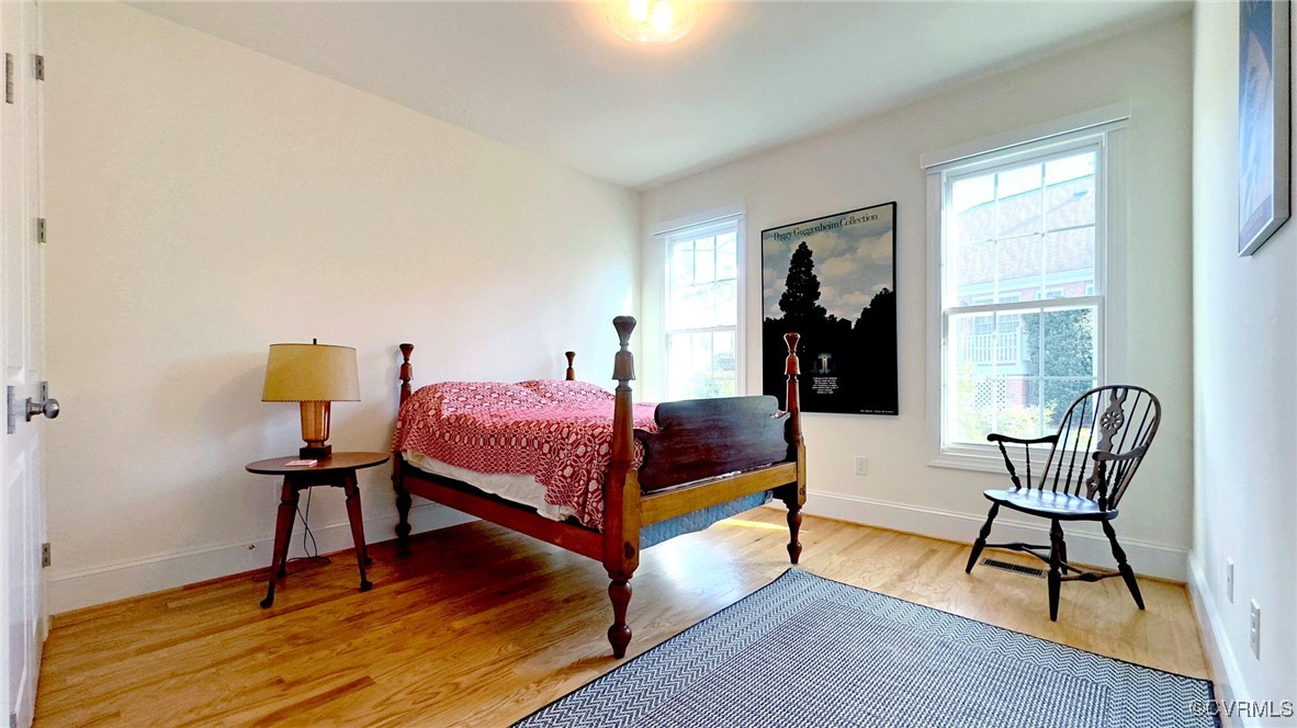 112 Nottinghamshire Williamsburg, VA 23188 - Photo 10 of 50 a bedroom with a bed and wooden floor