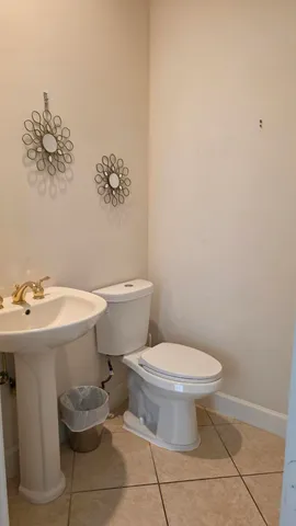 a kitchen with stainless steel appliances granite countertop a refrigerator stove and microwave