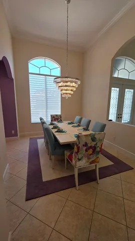 a kitchen with stainless steel appliances kitchen island granite countertop a refrigerator oven a sink and dishwasher