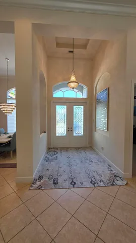 a bedroom with furniture and wooden floor