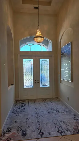 a bathroom with a sink a toilet and a shower