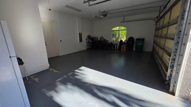 a bed room with a bed and a chandelier