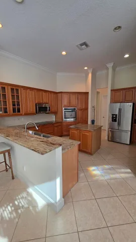 $879,323 | 8761 Bally Bunion Road, Port St. Lucie, FL 34986