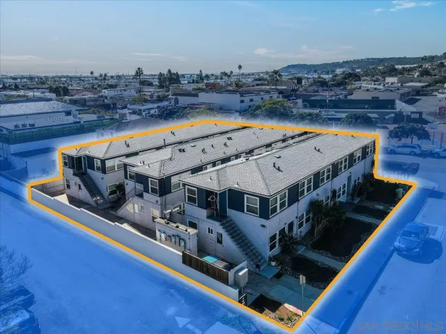 a view of a balcony with chairs