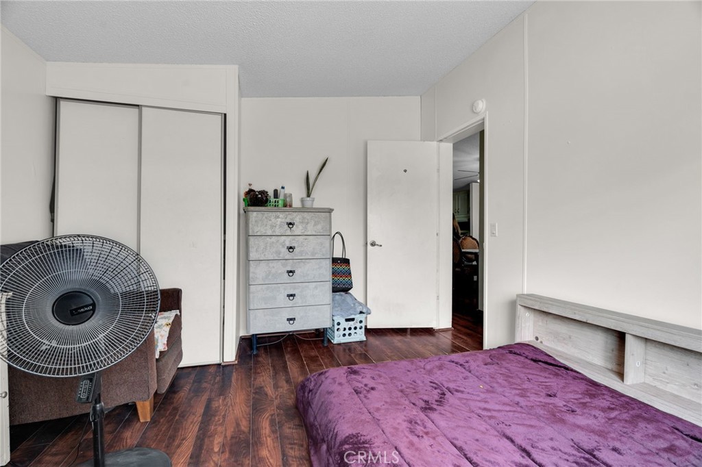 20401 Soledad Canyon Road, Unit 139 Canyon Country, CA 91351 - Photo 19 of 35 a bedroom with a bed and a closet