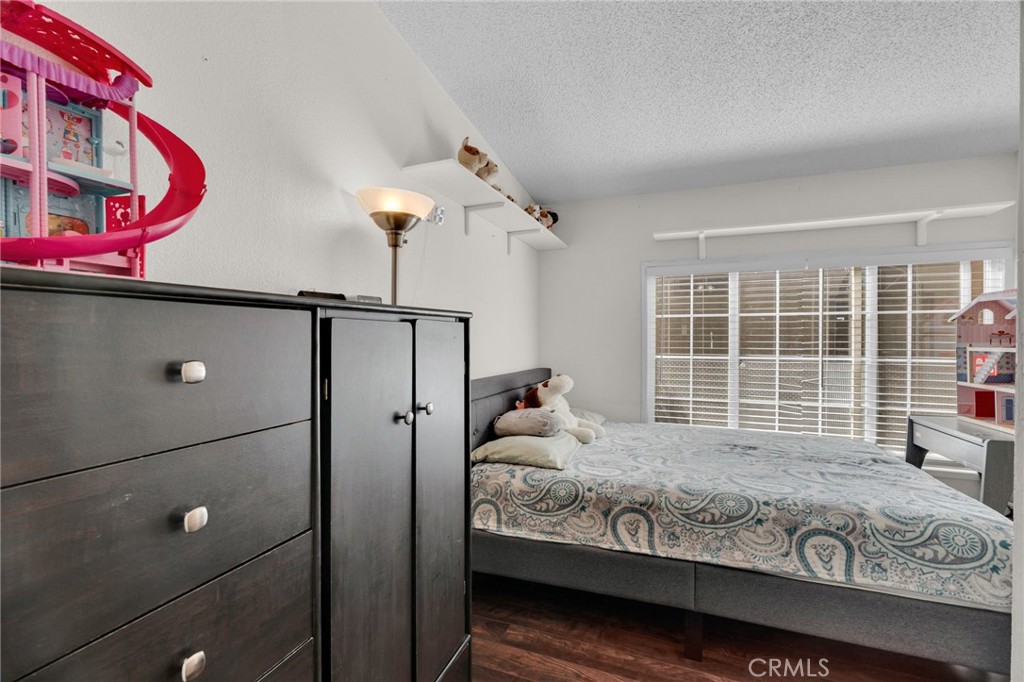20401 Soledad Canyon Road, Unit 139 Canyon Country, CA 91351 - Photo 20 of 35 a bedroom with bed and a window