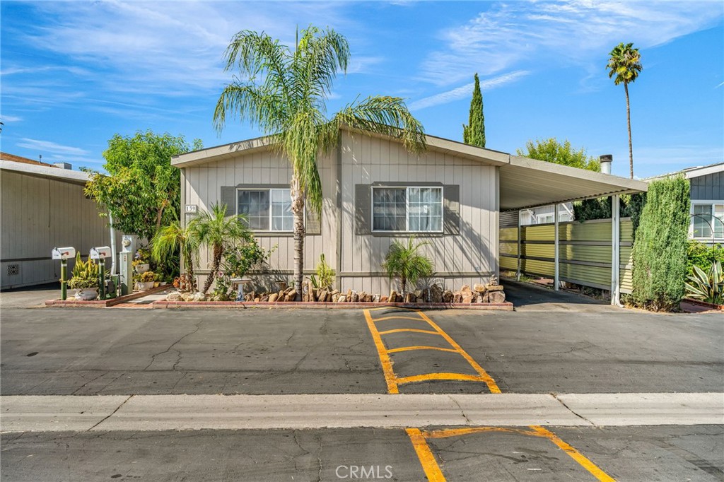20401 Soledad Canyon Road, Unit 139 Canyon Country, CA 91351 - Photo 2 of 35 a view of a house with a patio