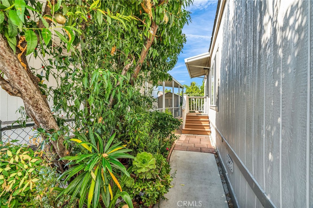 20401 Soledad Canyon Road, Unit 139 Canyon Country, CA 91351 - Photo 33 of 35 a view of a pathway both side of house