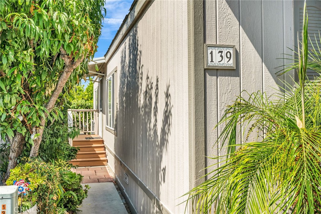 20401 Soledad Canyon Road, Unit 139 Canyon Country, CA 91351 - Photo 4 of 35 a view of a street with plants