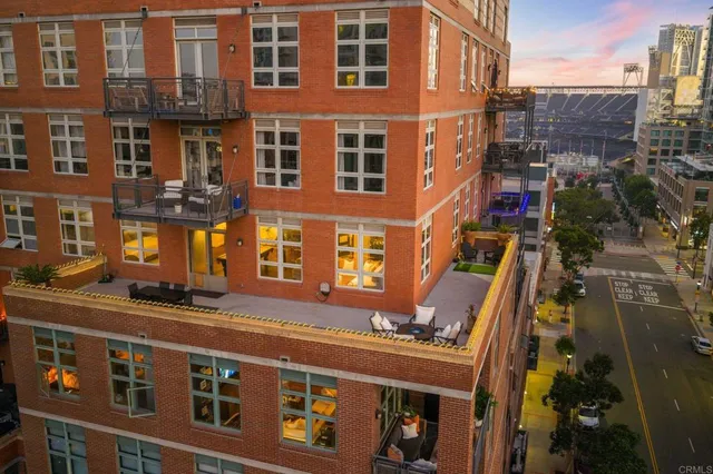 a front view of a building with glass windows