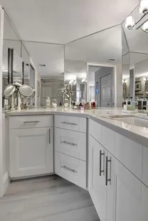 a bathroom with a toilet and shower