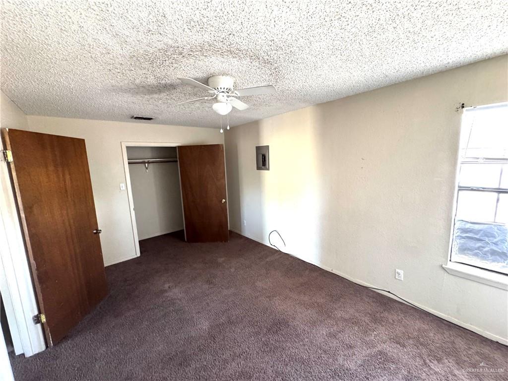1810 Jason Avenue Edinburg, TX 78539 - Photo 15 of 27 an empty room with windows and closet
