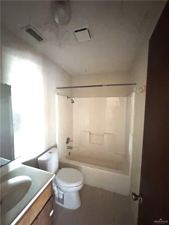1810 Jason Avenue Edinburg, TX 78539 - Photo 16 of 27 a bathroom with a toilet and a shower