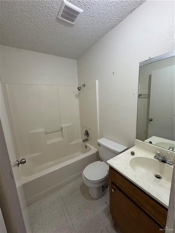 1810 Jason Avenue Edinburg, TX 78539 - Photo 23 of 27 a bathroom with a sink a toilet and a bathtub
