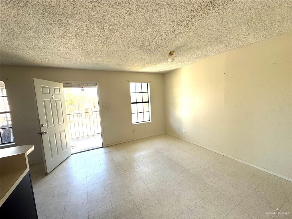 1810 Jason Avenue Edinburg, TX 78539 - Photo 24 of 27 wooden floor in an empty room with a window