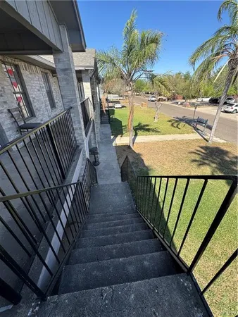 a view of balcony with wooden floor