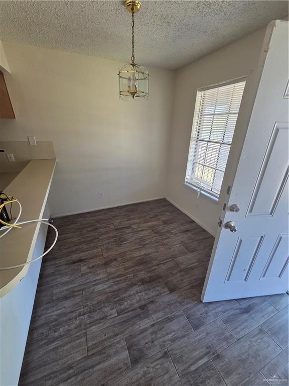 1810 Jason Avenue Edinburg, TX 78539 - Photo 7 of 27 wooden floor in an empty room with a window
