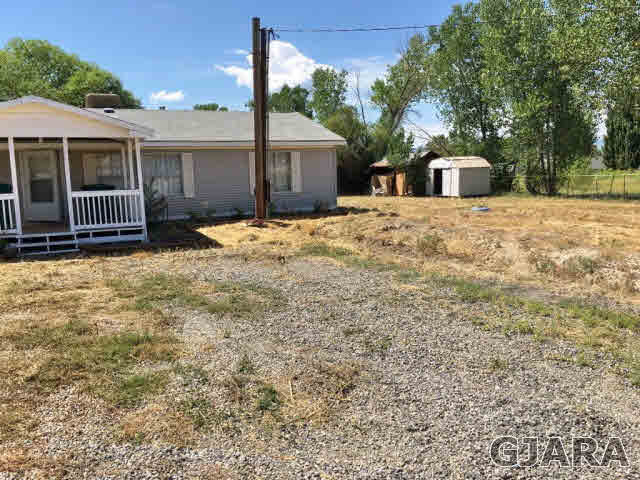 532 34 Road, Unit A Clifton, CO 81520 - Photo 11 of 11 a house with trees in front of it