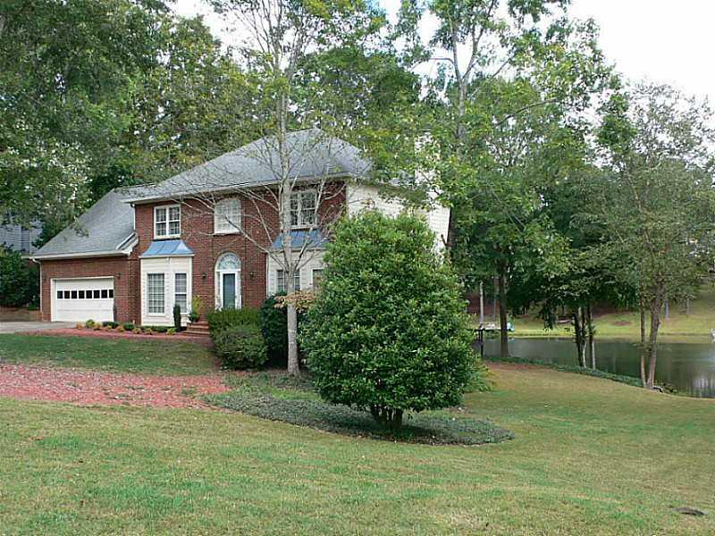 569 Ripplewater Drive Southwest Marietta, GA 30064 - Photo 1 of 1 Exterior Front. Unbelievable lake location with dock.