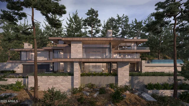 a front view of a house with a yard and tree s